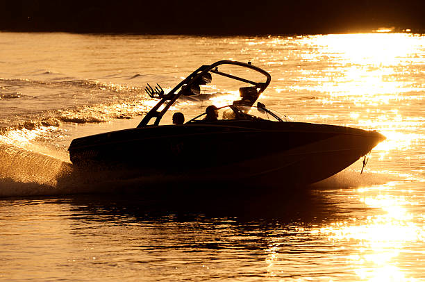 wakeboardboat - wakeboarding waterskiing water ski sunset ストックフォトと画像