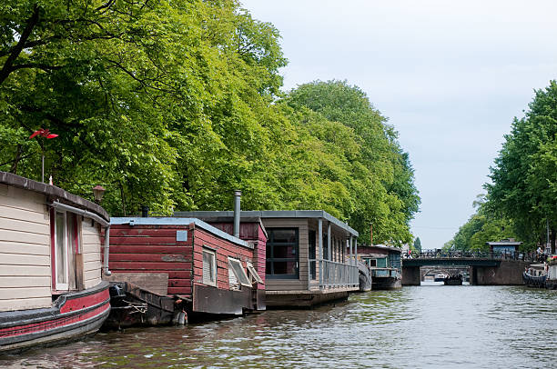 istock Amsterdam seen from canal boat 182836062