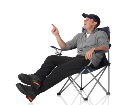 Camper in chair pointing