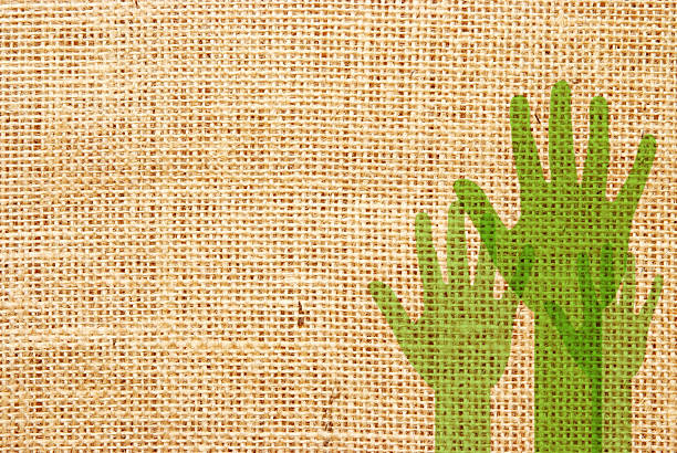 grüne hände - backgrounds burlap textured effect textile stock-grafiken, -clipart, -cartoons und -symbole