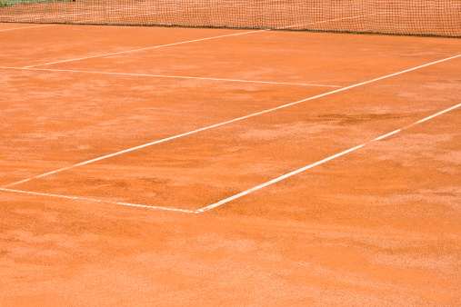 tennis court with tennis ball and rackettennis court with tennis ball and racket