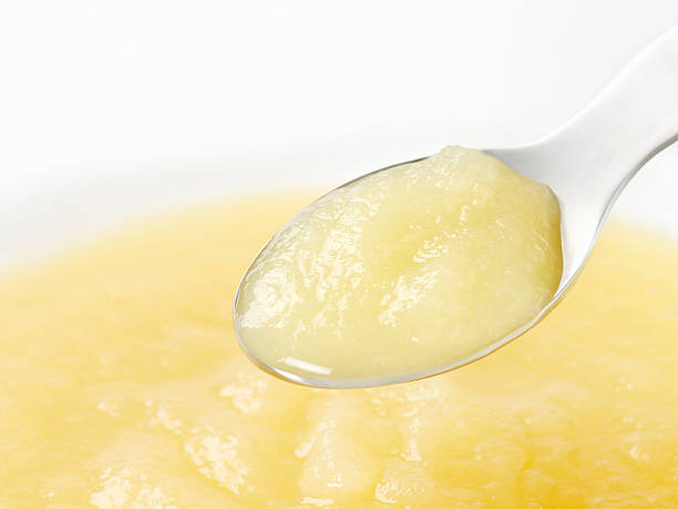 Apple Sauce Baby Food on a Spoon -Photographed on Hasselblad H1-22mb Camera