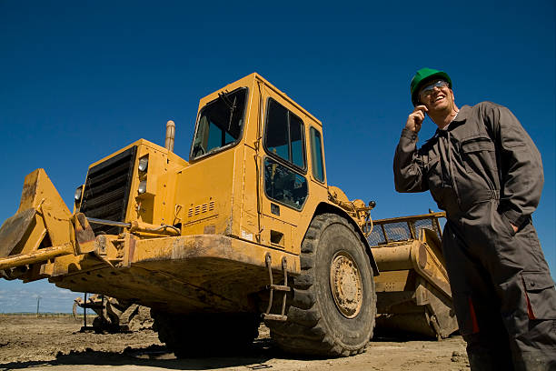 empreiteira no telefone - construction machinery machine industrial equipment grader - fotografias e filmes do acervo