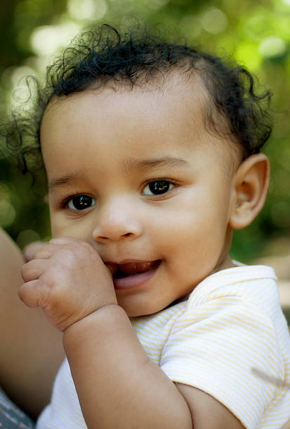 istock Cute baby sucking thumb 182837233