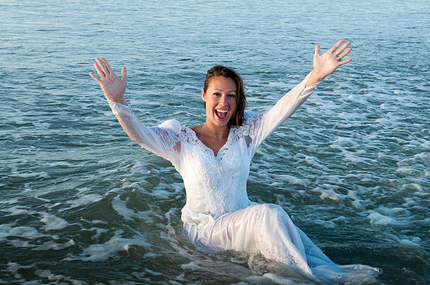 istock Happy Bride In The Ocean 182837447