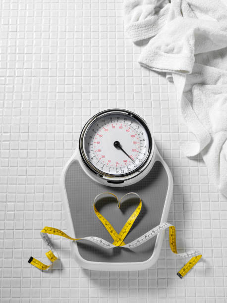 istock Heart Tape Measure and bathroom Scales 182837500