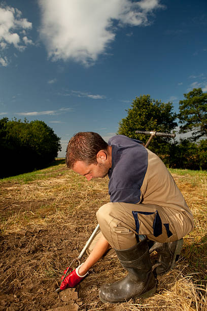 Taking samples of the soil and groundwater, environmental research If you want more related images with environmental research click here. soil sample stock pictures, royalty-free photos & images