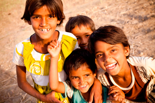 Group of Cheerful Rural Indian Children in Rajasthan just before the sunset