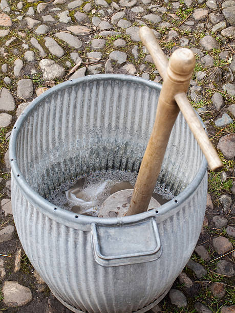 istock Dolly tub and agitator old laundry washing 182838447