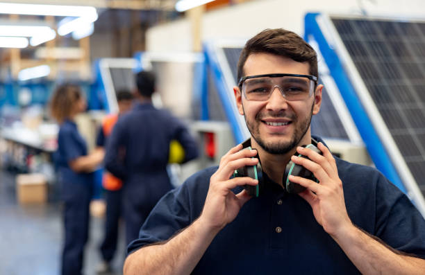 istock Employee working at a solar panel factory 1828385322