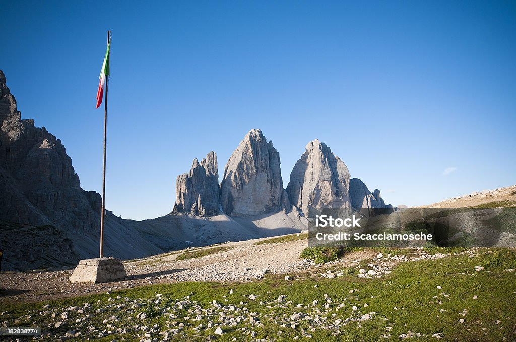 Three Peaks of Lavaredo and Italian flag "Lavaredo Three Peaks and Italian flag, Dolomites, Italy.More photos about the Dolomites" Alto Adige - Italy Stock Photo