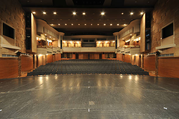 Theater stage View from the stage on the seats in clasical theater. concert hall photos stock pictures, royalty-free photos & images
