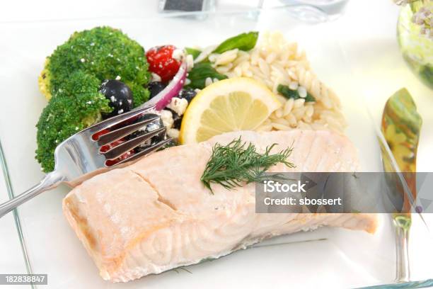 Poached Salmon With Lemon And Seasoning Stock Photo - Download Image Now - Poached Salmon, Salad, Barley