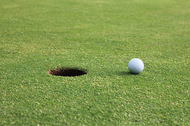 istock Golf Ball Near the Hole 182839026