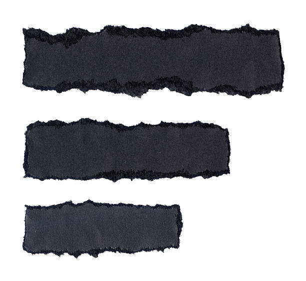istock Torn Piece of Black Paper 182839274