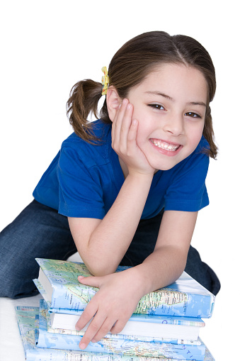 Smiling girl with textbooks