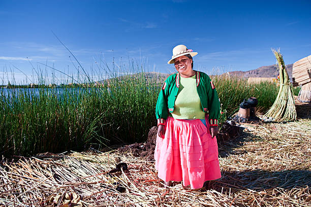 istock Uros woman on floating island 182839412