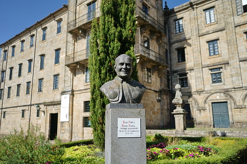 Bust of Pope John Paul II in front of the San Martín Pinario hostel Santiago de Compostela, Galicia, Spain 10092023