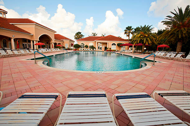 tropical pool tropical pool in a retirement communityClick here to view my other Tropical and Beach images country club stock pictures, royalty-free photos & images