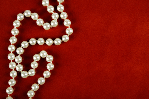 woman wearing pearl diamond necklace close-up photo