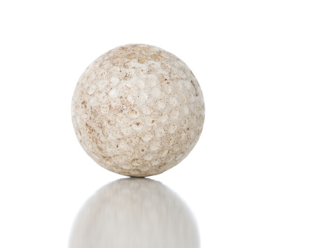 A dirty old golf ball.