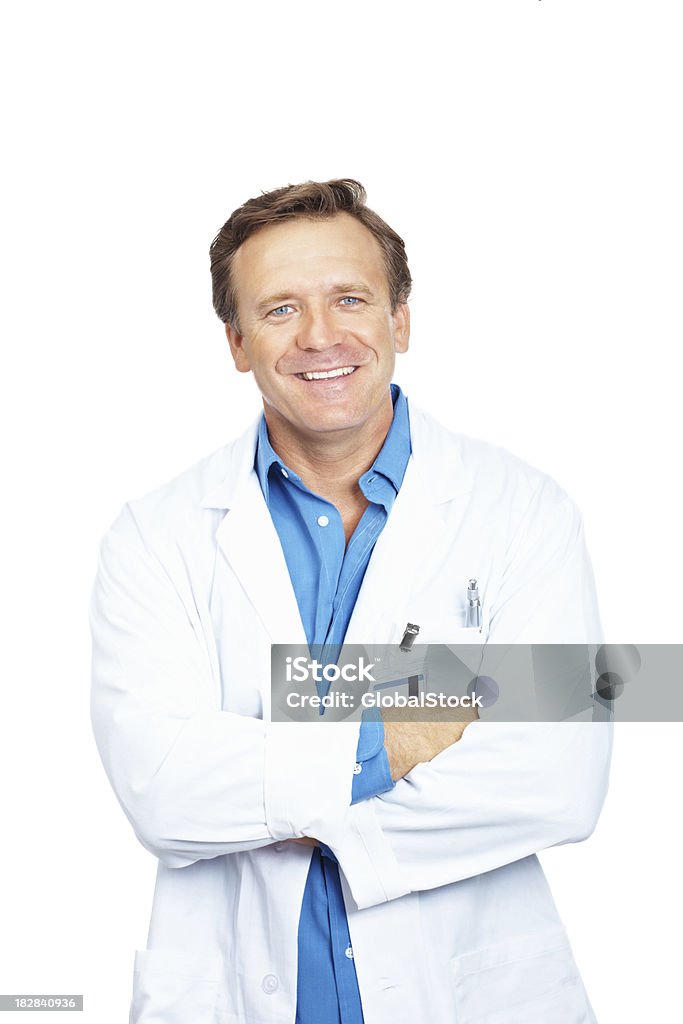 Portrait of a smiling mature doctor standing against white background Portrait of a smiling mature doctor with arms crossed standing against white background Doctor Stock Photo