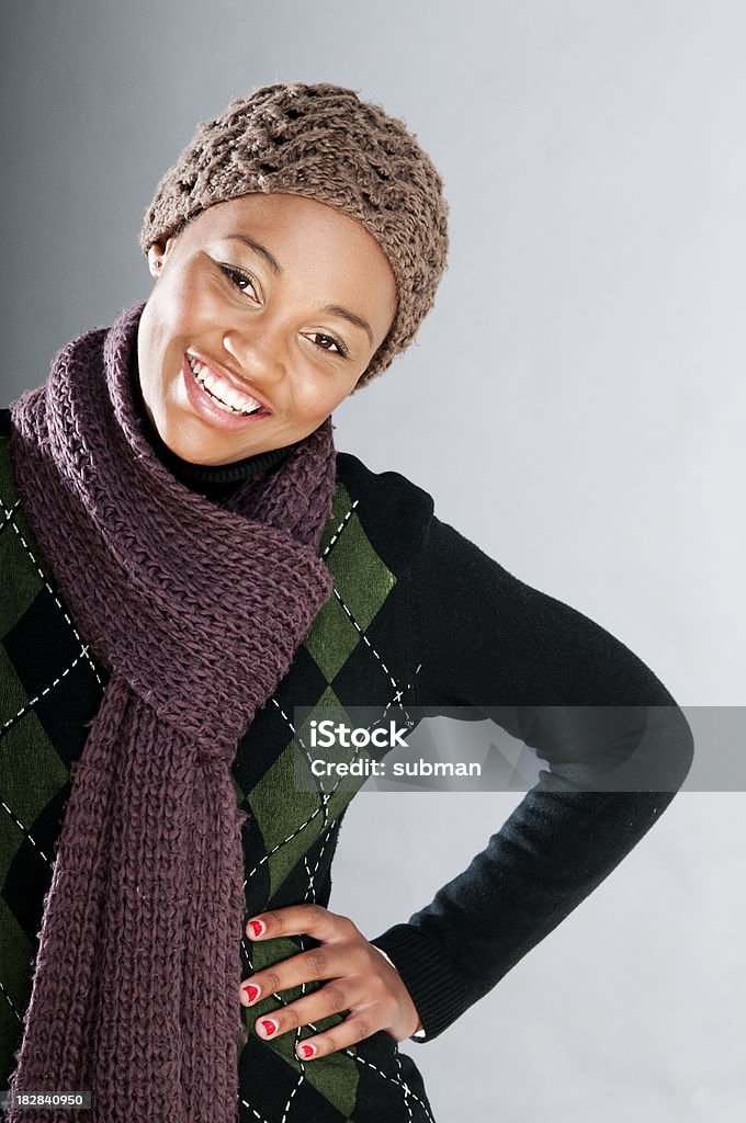 Smiling young South African girl in winter Smiling young South African girl wearing warm wool clothes for winter. Adult Stock Photo