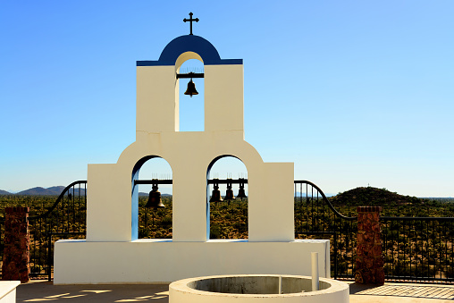 Greek Orthodox chapel bells in Arizona desert at sunset