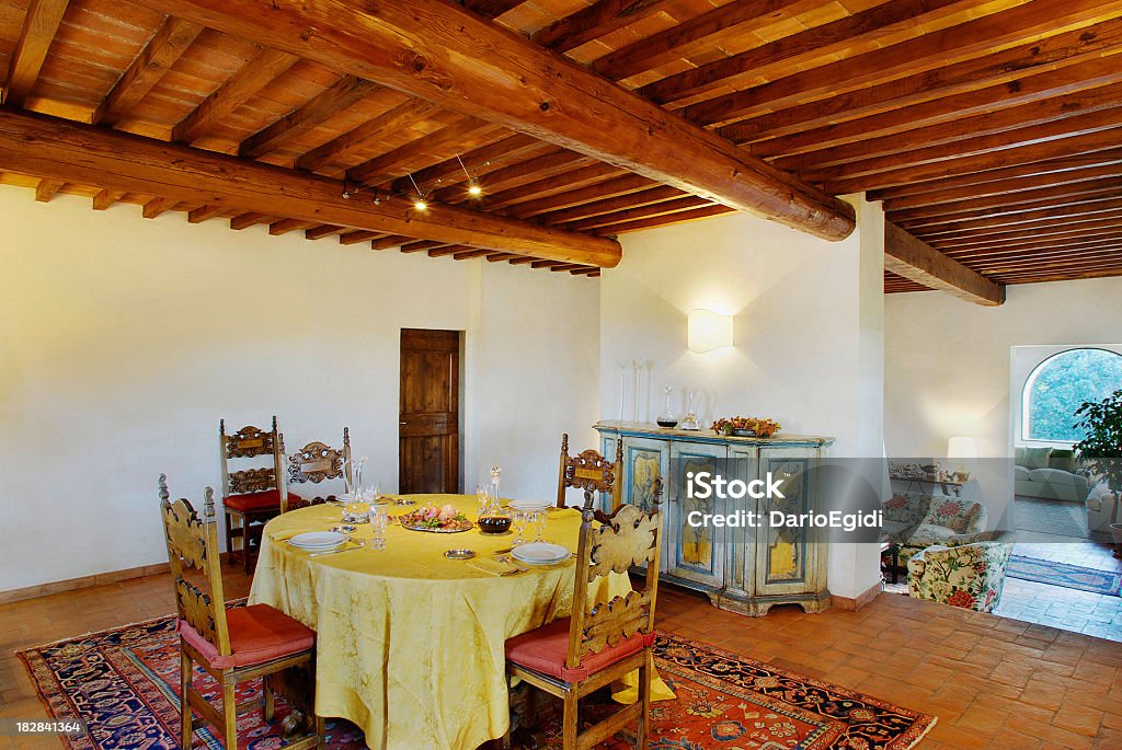 Table set in elegant old style dining room, country house House Valle Bandina is located near Florence Tuscany Italy Indoors Stock Photo