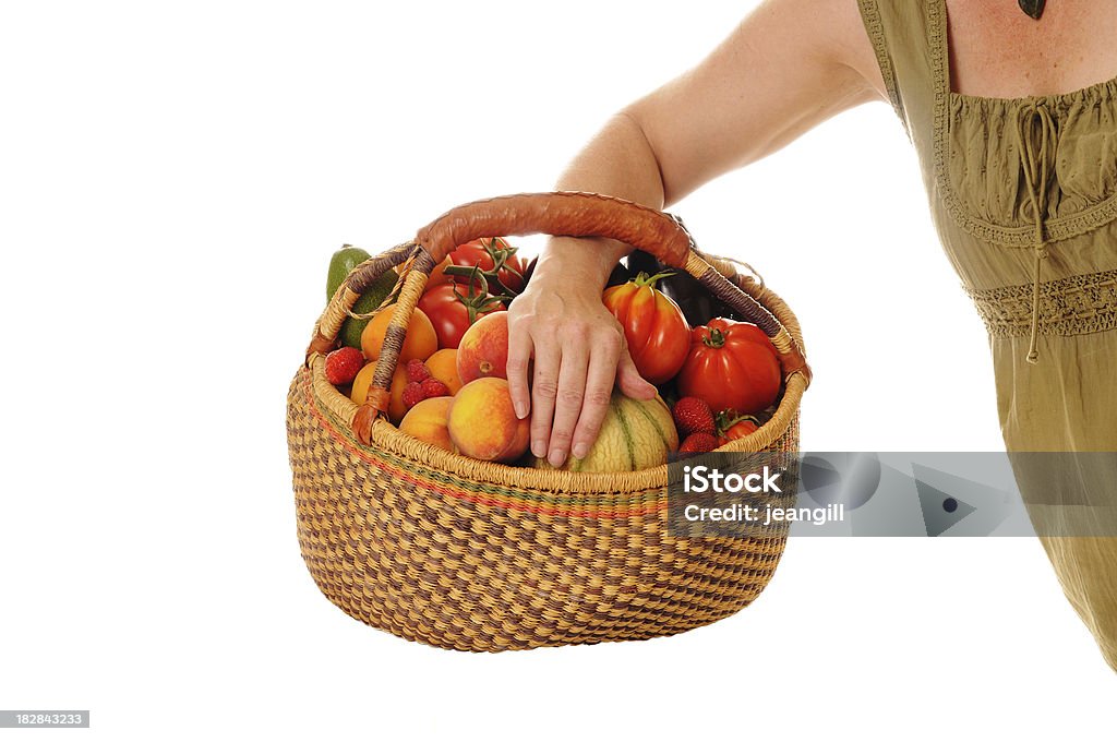 Frau mit Korb von Obst am arm - Lizenzfrei Weißer Hintergrund Stock-Foto
