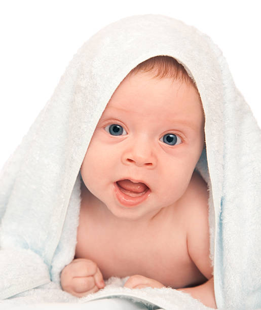 istock baby and towel 182843559