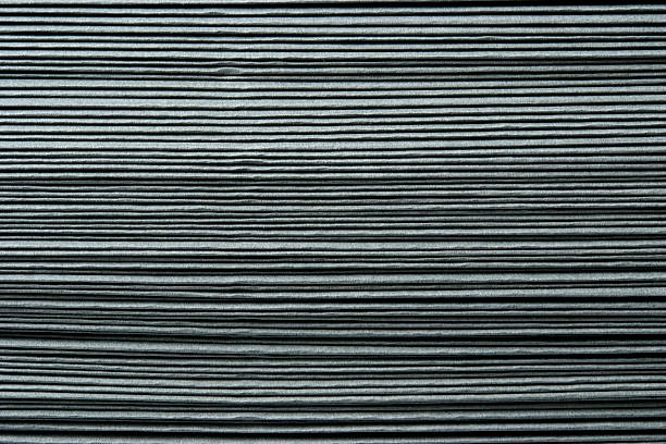 istock Close-up of stacked gray envelopes texture background 182843730