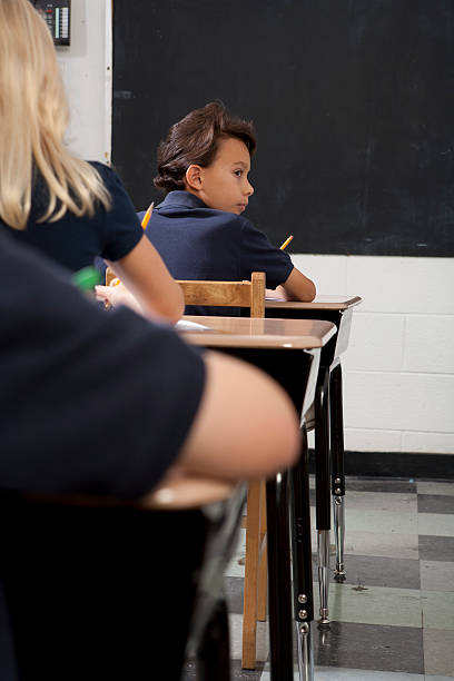 istock Row of school kids 182844239