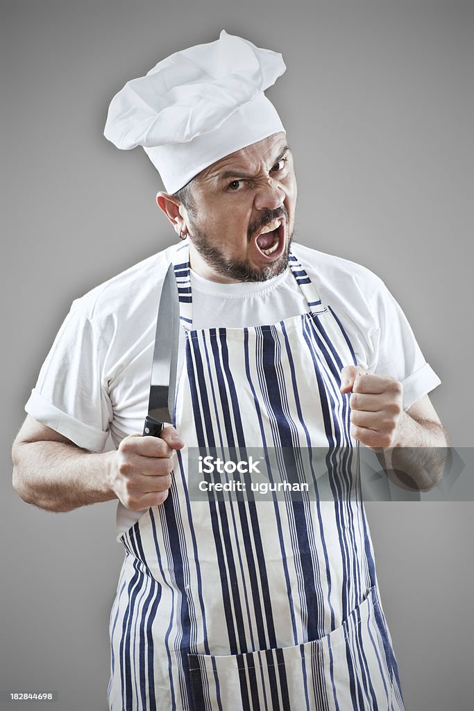 chief "Angry chef with a knife  in his hand, ready to beat up something." 35-39 Years Stock Photo