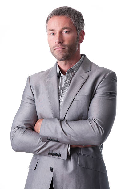 istock tough businessman with arms crossed 182845341