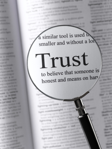 dictionary close up highlighting trust