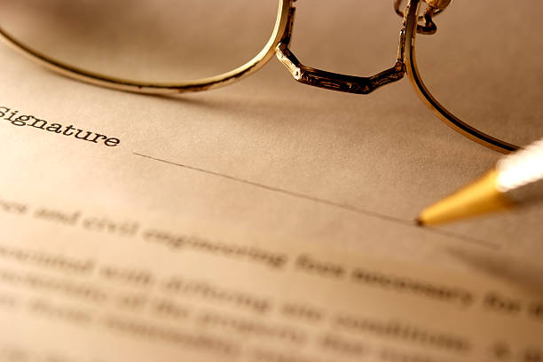 istock Sepia toned Image of signing a contract 182846183