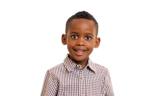 An African American smiling and looking at the camera isolated on white