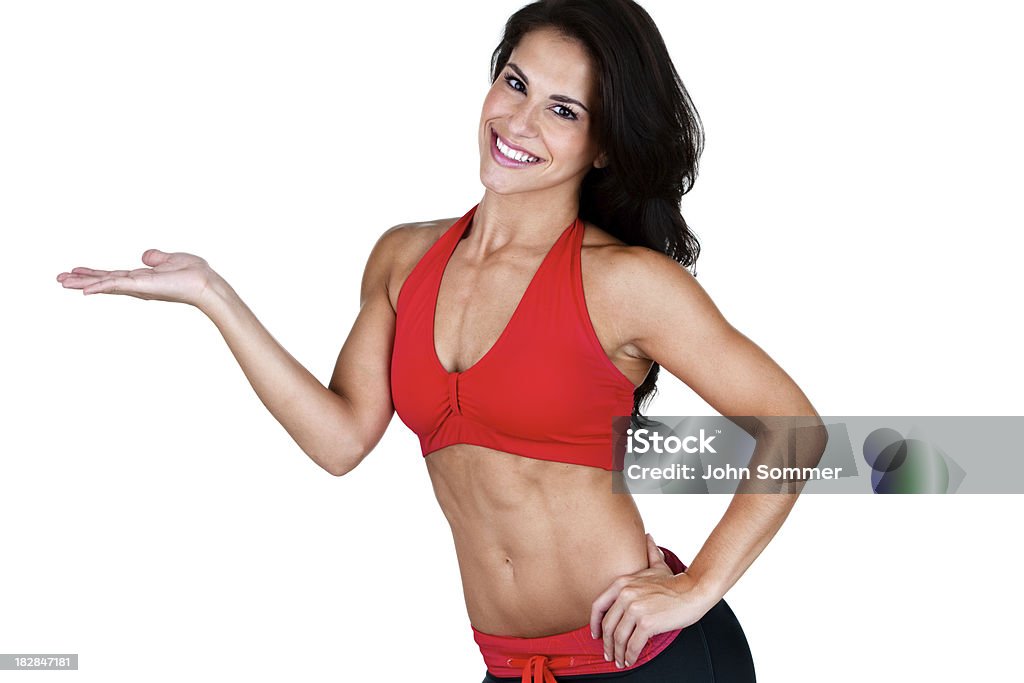 Fitness donna con la mano per spazio di copia - Foto stock royalty-free di 20-24 anni