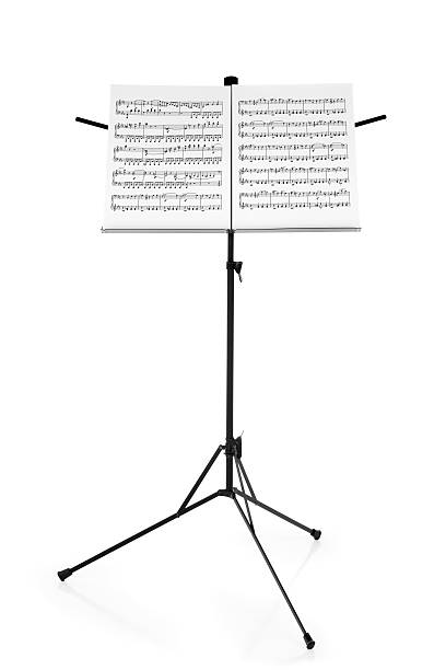 Stand with Sheet Music "Music stand with piano sheet music, isolated on white. The sheet music is in public domain, and is a section of Beethoven's sonata number eight.Please also see:" musical note photos stock pictures, royalty-free photos & images