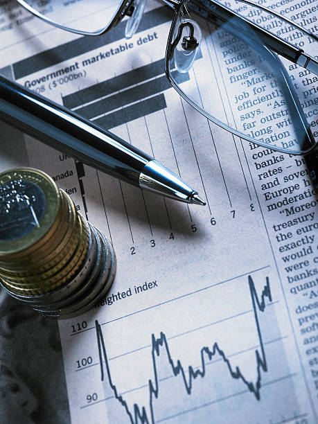 istock Financial Chart with Glasses And Coins 182848003