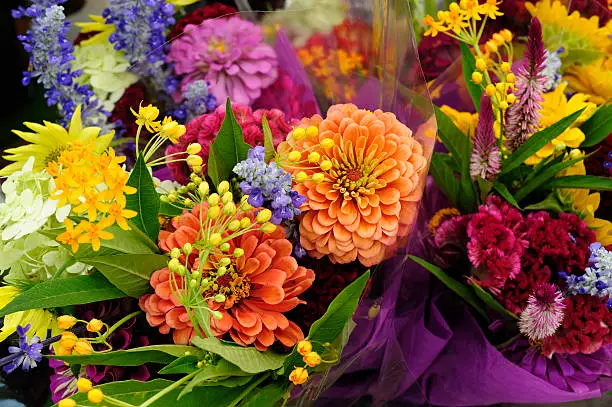 Photo of Fresh Colorful Variety Flowers For Sale at Outdoor Market