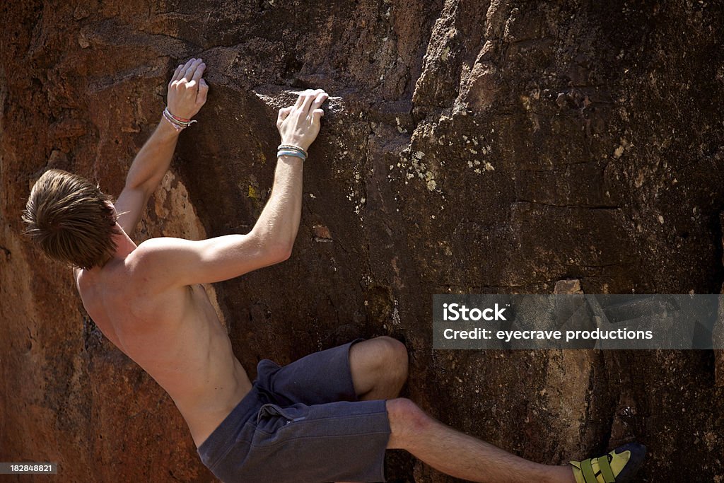 colorado rock climbing bouldering male colorado summer rock climbing bouldering(natural light on a sunny summer day - Intense sun/shadows intentional - photos professionally retouched - Aperture/Photoshop) Active Lifestyle Stock Photo
