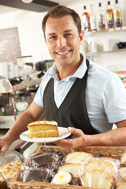 istock Café Waiter Serving In Coffee Shop 182849088