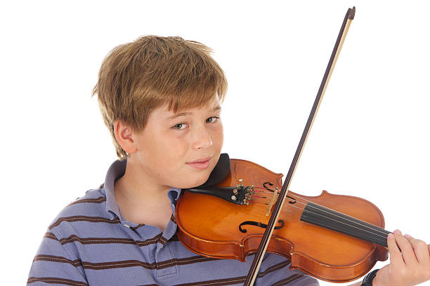istock Eleven Year Old Boy Playing The Violin 182849862