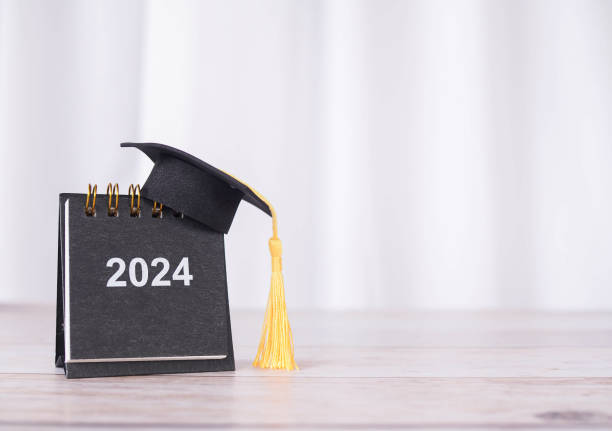 istock Study goals, 2024 Desk calendar with graduation hat. The concept for Resolution, Goal, Action, Planning, and manage time to success graduate. 1828499415