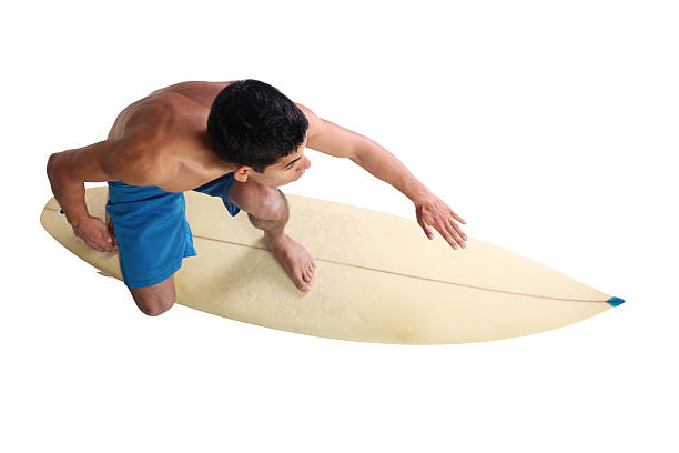 вид сверху на изолированных мужской серфер - swimming shorts surfing male full length стоковые фото и изображения