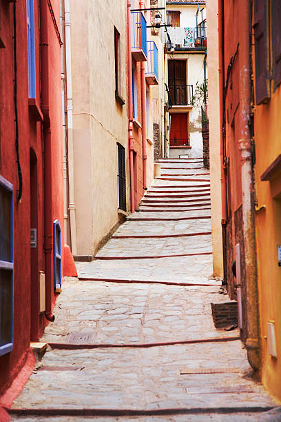 Cobbled street with colourful houses in the town of Collioure in the south of France.