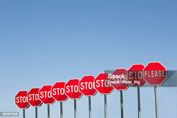 Row Of Stop Signs 2 Stock Photo - Download Image Now - Blue, Concepts, Copy Space