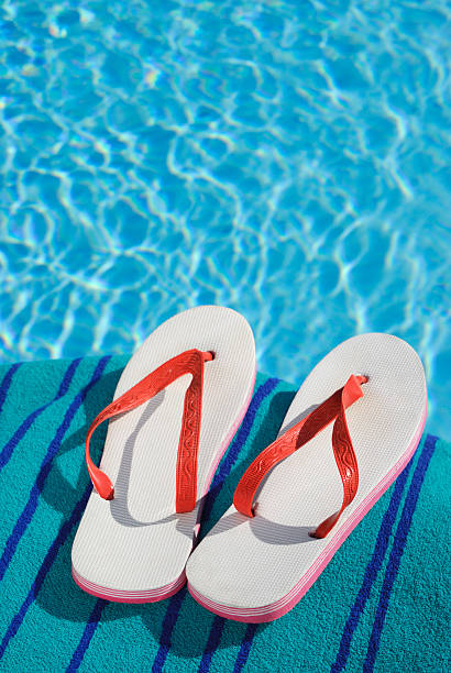 istock Sandals by a Swimming Pool 182851383
